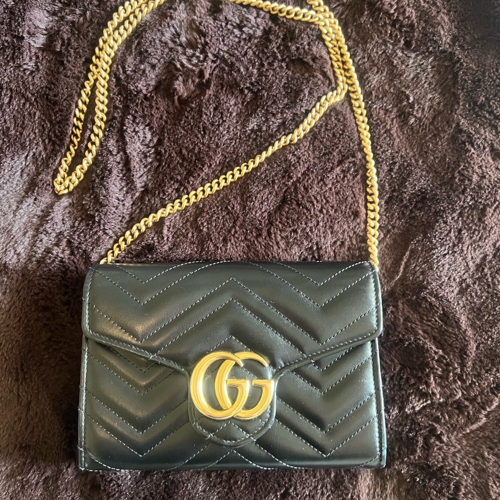 Gucci wallet on chain